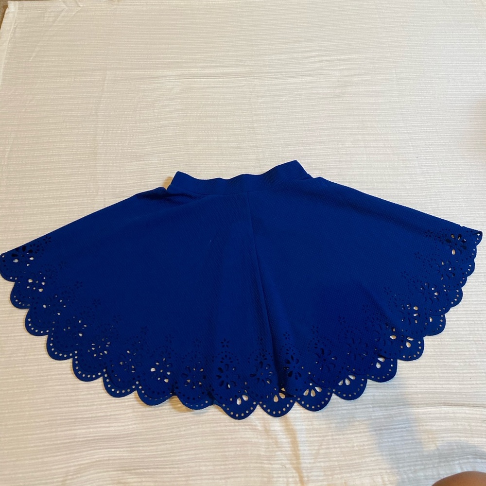 Short blue skirt.